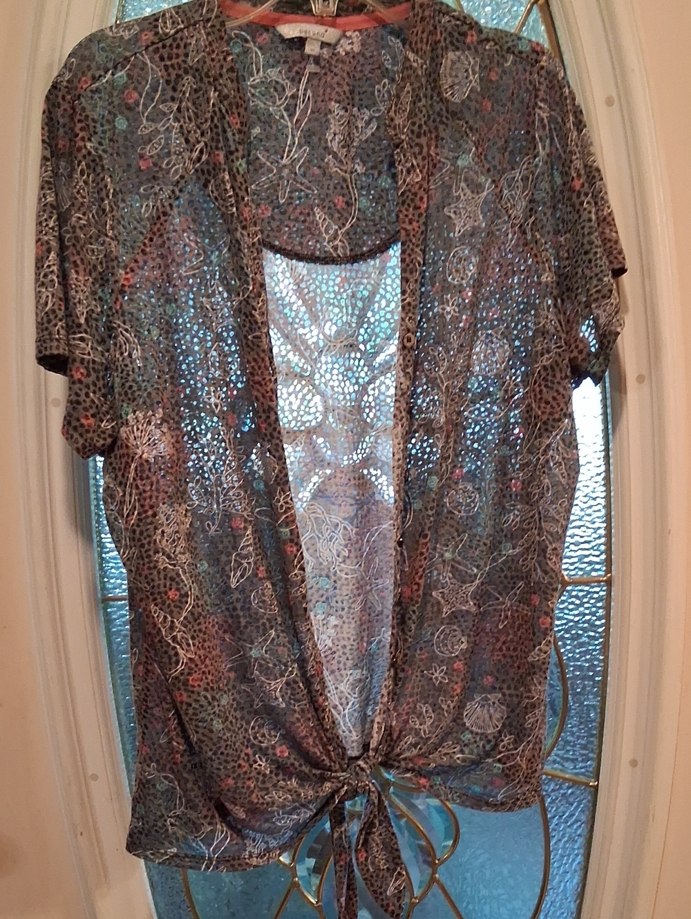 per una Sheer Multicolor Sea Shell And Coral Print Top in Gray, Teal & Coral.